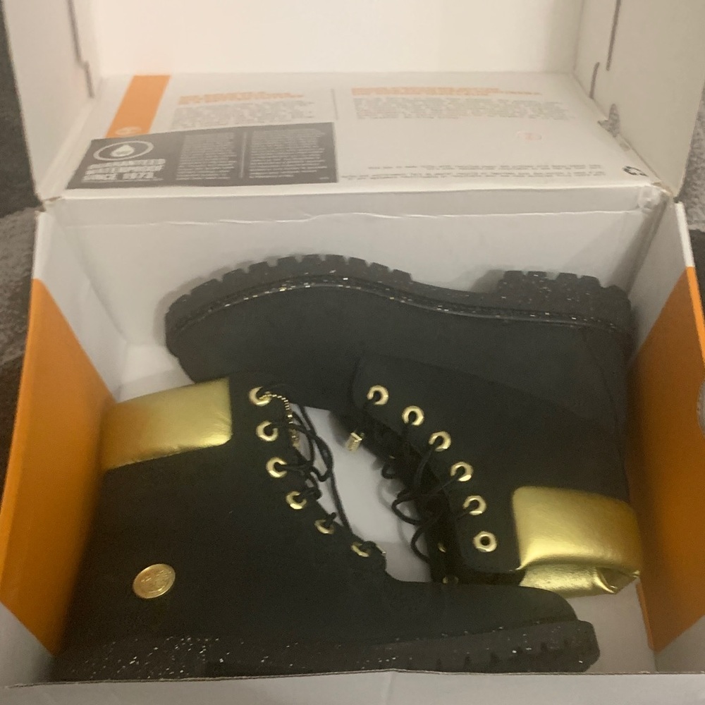Timberlands Black and Gold shoe